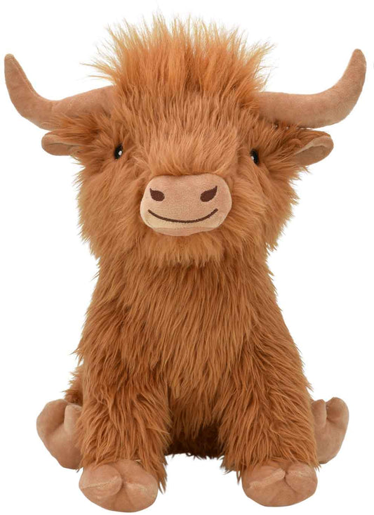 Plush toy of a brown Highland cow on a white background