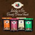 Load image into Gallery viewer, Four bags of Romm pet food with the brand logo and text on a brown background
